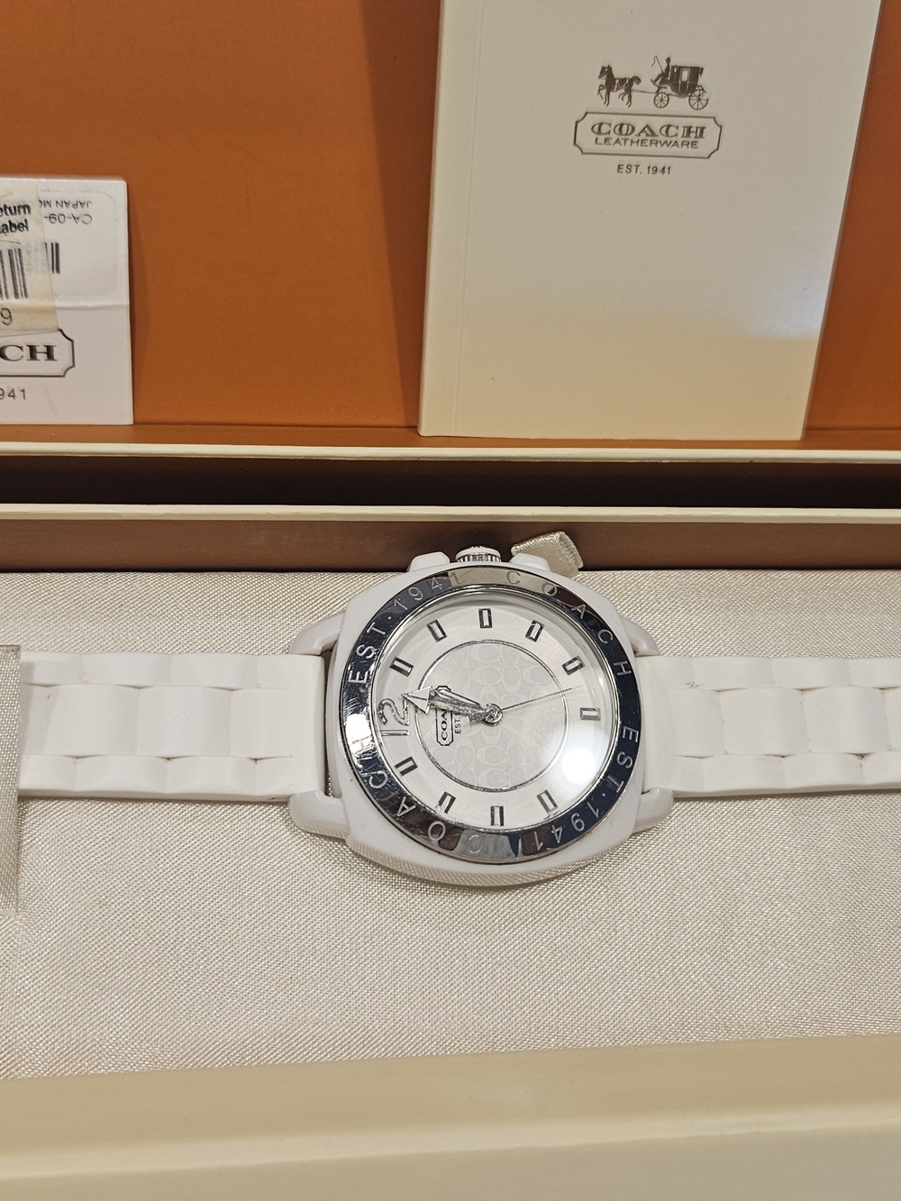 Coach White Silicone Women’s Watch with Silver-Tone Bezel and Black Accent